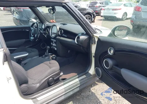 2010 Mini Cooper S z USA, uszkodzony, nr VIN WMWMS3C54ATY08644